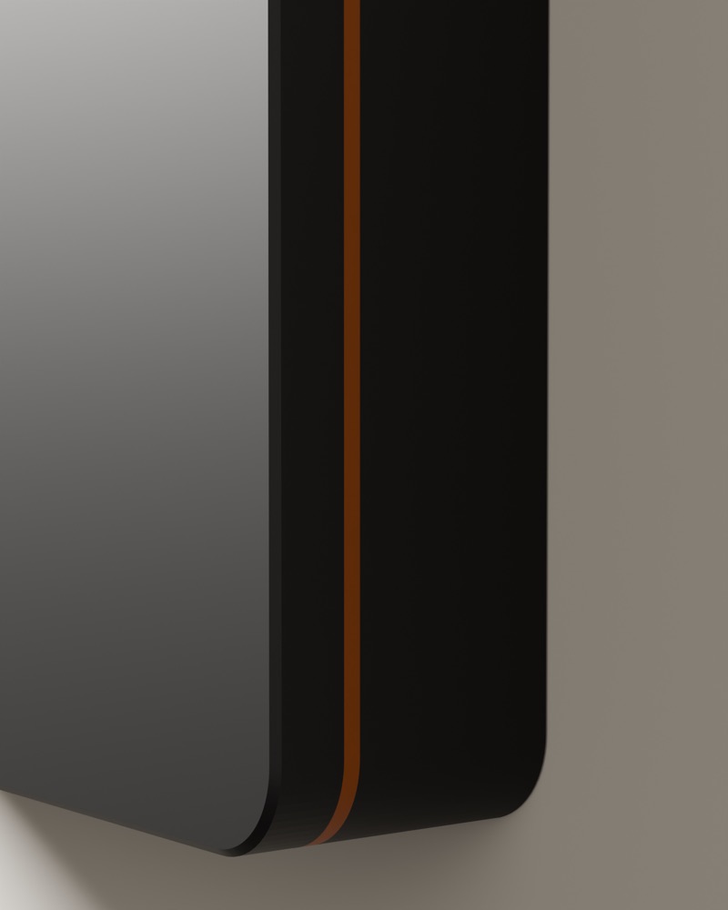 Close-up of the copper line running round the side of a graphite cover